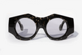 Dettaglio frontale occhiali da sole Spike Lee avana, montatura rotonda in acetato italiano premium