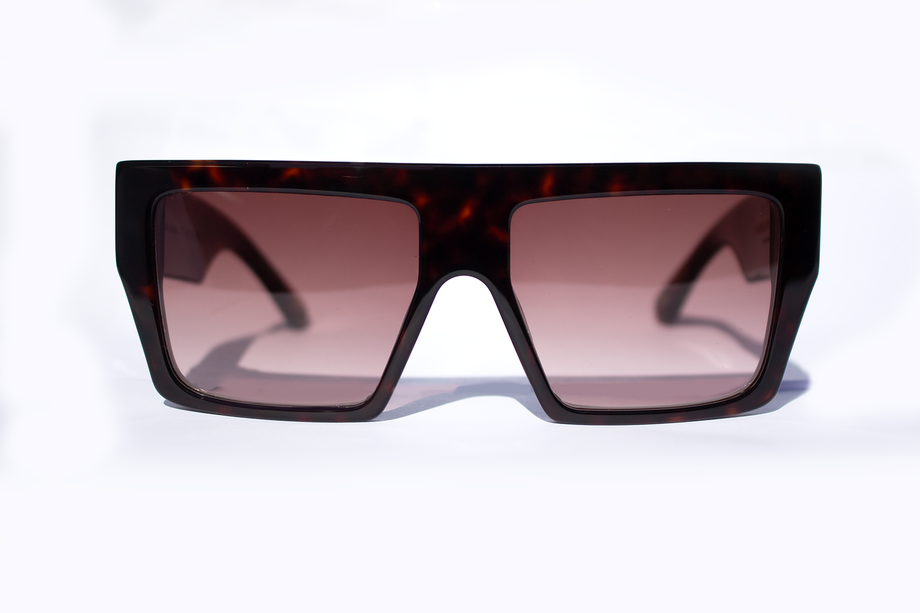 Occhiali da sole Tornabuoni in acetato premium avana marrone - vista frontale design italiano artigianale, inserto velluto fiorentino, galuchat nera 