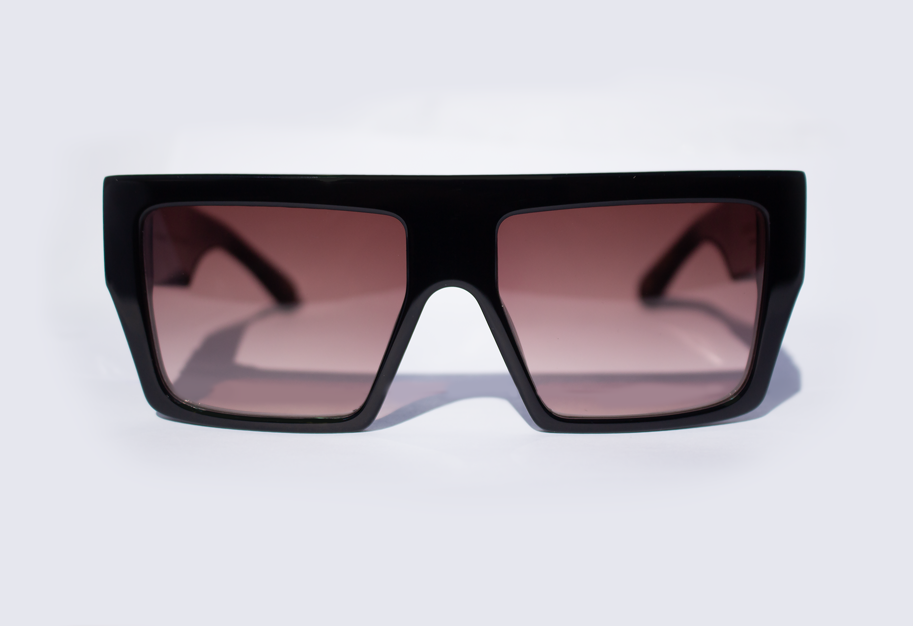 Occhiali da sole Tornabuoni in acetato premium nero - vista frontale design italiano artigianale, inserto velluto fiorentino